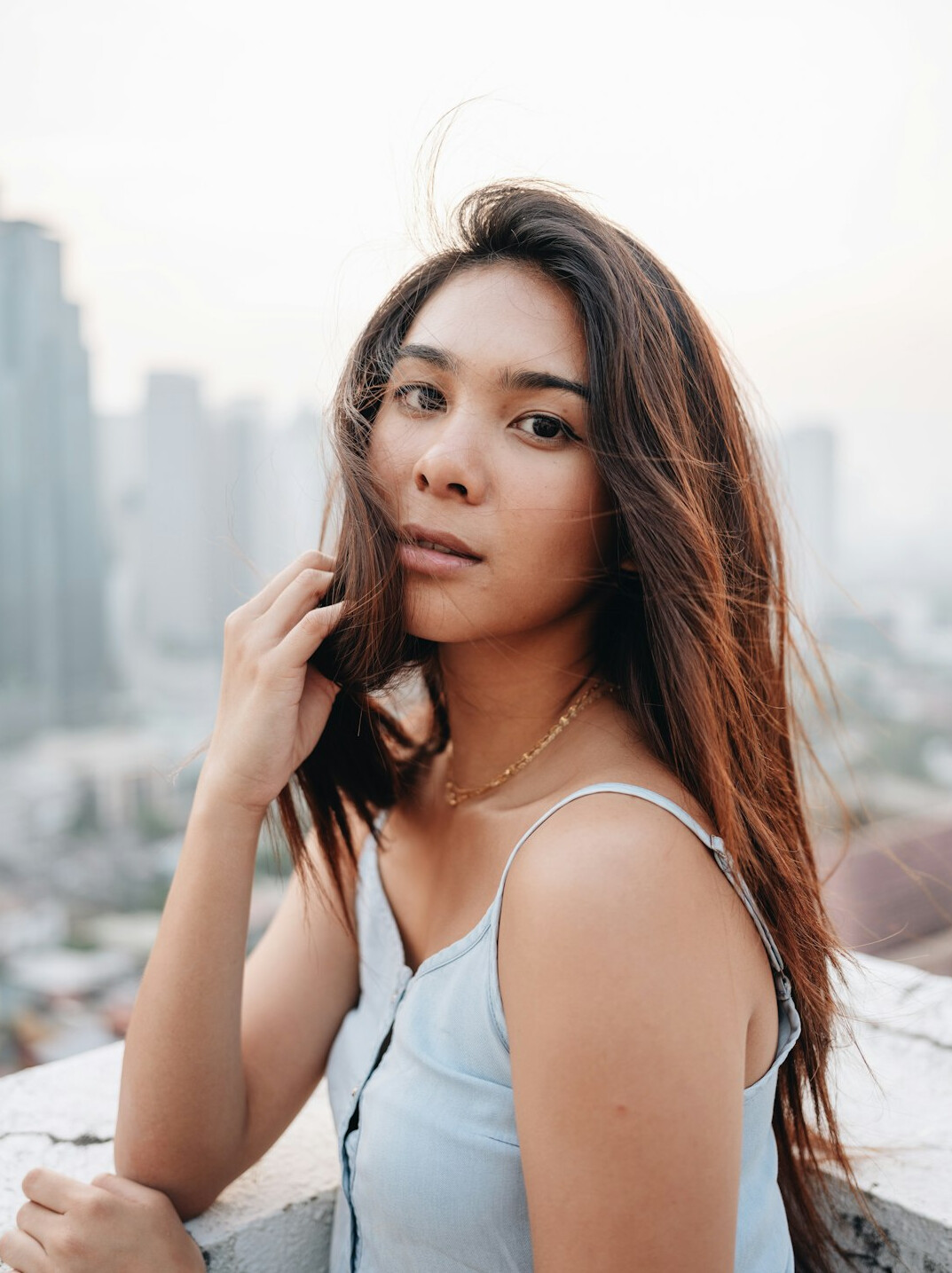Portrait of a smiling woman with brown hair